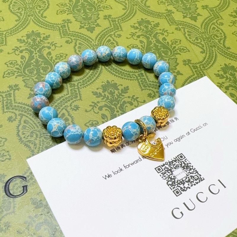 G*u*i bracelets